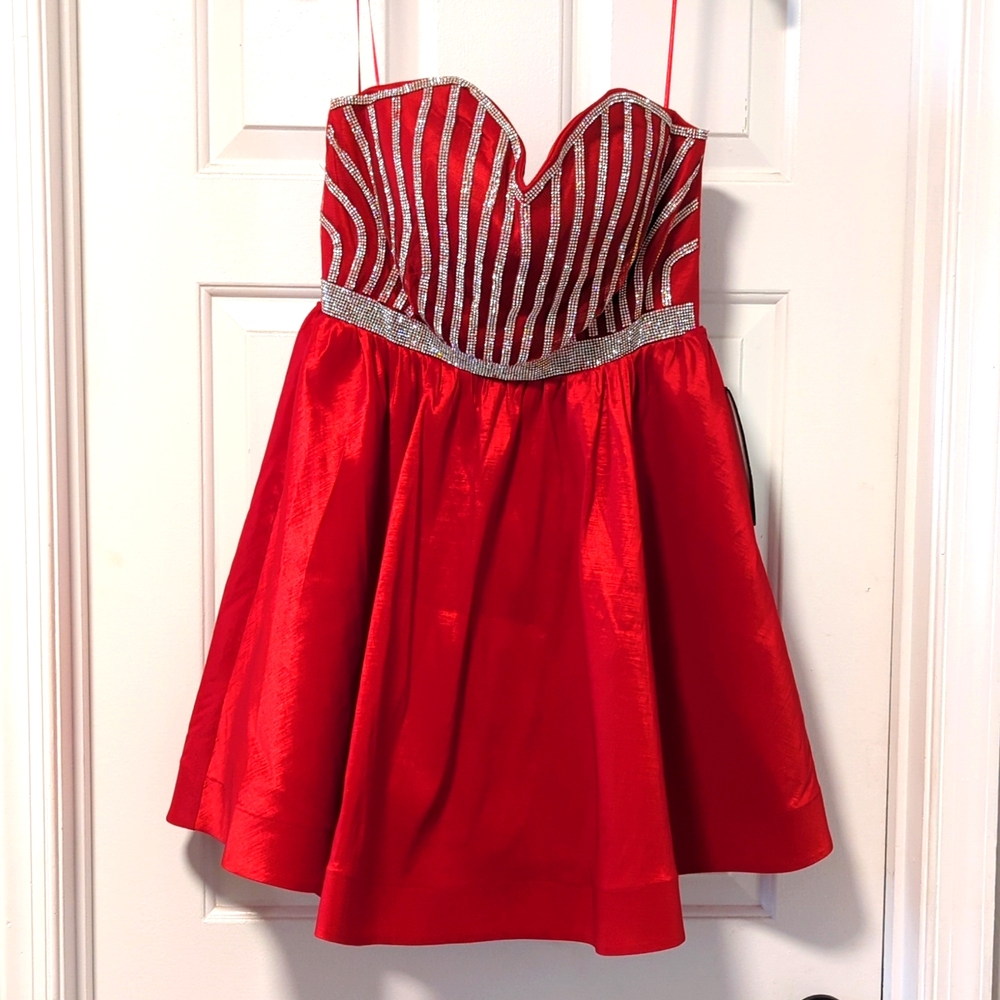 Red cocktail/prom dress with beautiful diamond detail on the front